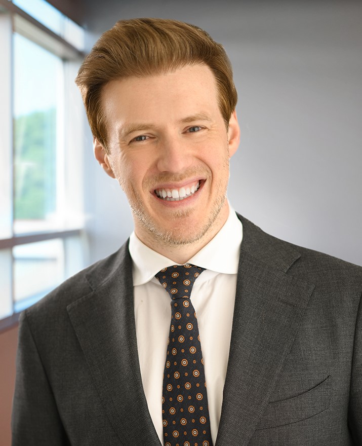 Headshot of Fitch Johnson Larson attorney Sam Schurman